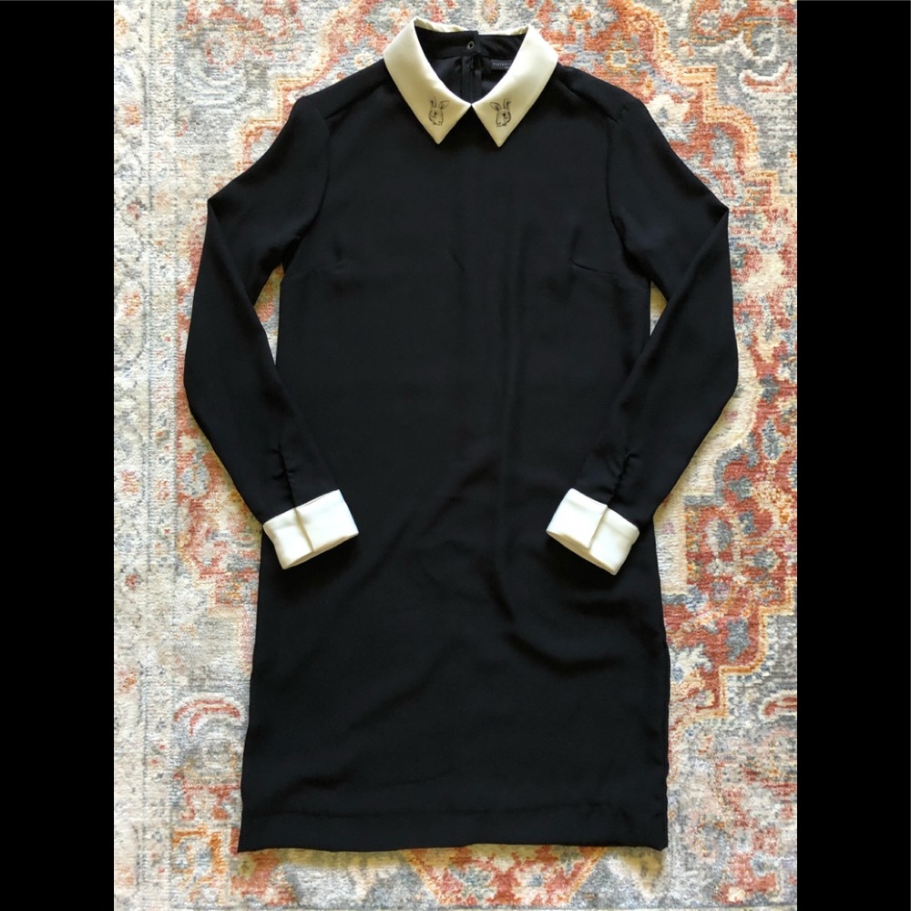Black dress with white collars